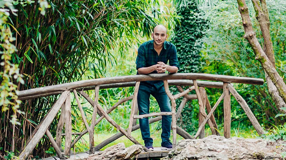 Picture of CGG researcher Milad Farshad into the forest
