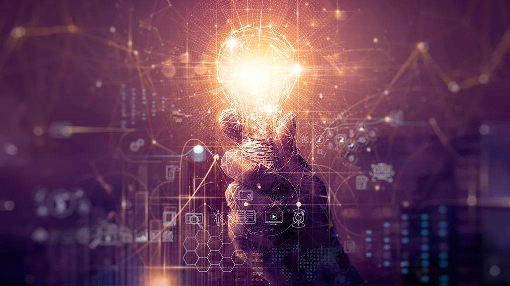 Conceptual illustration of an idea with a shining light held by a hand